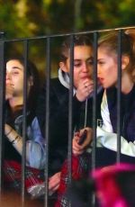 MILEY CYRUS and STELLA MAXWELL at Disneyland in Anaheim 07/14/2015