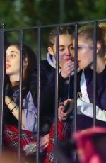 MILEY CYRUS and STELLA MAXWELL at Disneyland in Anaheim 07/14/2015