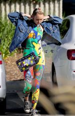 MILEY CYRUS in Tights Out and About in Los Angeles 07/28/2015