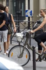MIRA SORVINO Riding a Bike Out in Paris 07/04/2015