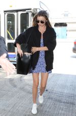 MIRANDA KERR Arrives at LAX Airport in Los Angeles 06/30/2015