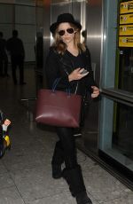 NATALIE DORMER at Heathrow Airport in London 070/14/2015