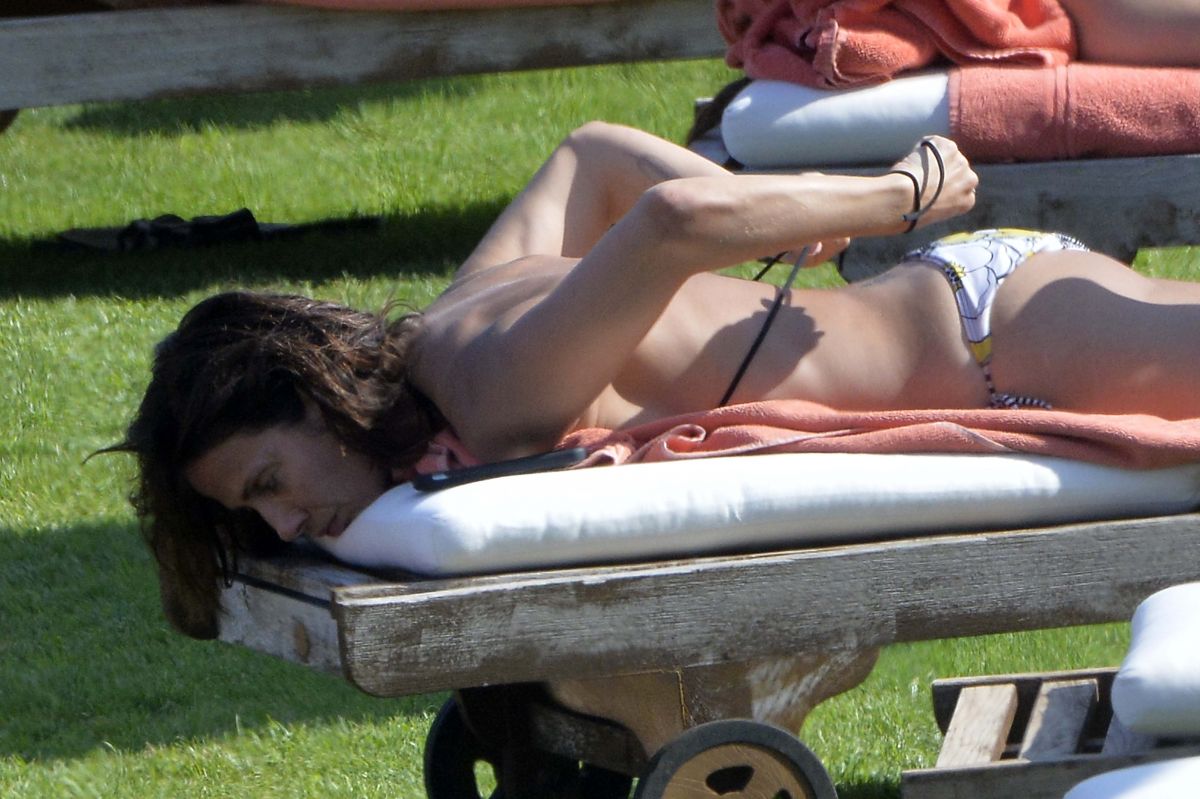 NATALIE IMBRUGLIA in Bikini at a Pool in Sardinia 07/23/2015.