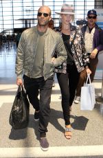 ROSIE HUNTINGTON-WHITELEY and Jason Statham at LAX Airport in Los Angeles 07/23/2015
