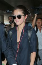 SELENA GOMEZ Arrives at LAX Airport in Los Angeles 07/28/2015