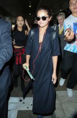 SELENA GOMEZ Arrives at LAX Airport in Los Angeles 07/28/2015