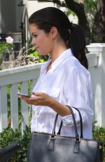 SELENA GOMEZ Leaves a Friend