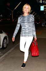 SHARON STONE Arrives at LAX Airport in Los Angeles 07/30/2015