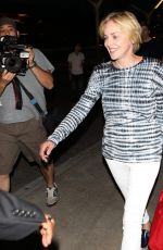 SHARON STONE Arrives at LAX Airport in Los Angeles 07/30/2015