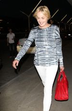 SHARON STONE Arrives at LAX Airport in Los Angeles 07/30/2015