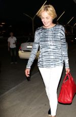 SHARON STONE Arrives at LAX Airport in Los Angeles 07/30/2015