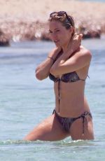SIENNA MILLER in Bikini at a Beach in Formentera 07/03/2015