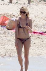 SIENNA MILLER in Bikini at a Beach in Formentera 07/03/2015