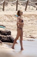 SIENNA MILLER in Bikini at a Beach in Formentera 07/03/2015