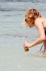 SIENNA MILLER in Bikini at a Beach in Formentera 07/03/2015
