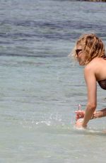 SIENNA MILLER in Bikini at a Beach in Formentera 07/03/2015