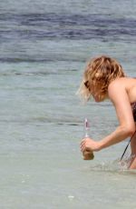 SIENNA MILLER in Bikini at a Beach in Formentera 07/03/2015