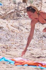 SIENNA MILLER in Bikini at a Beach in Formentera 07/03/2015
