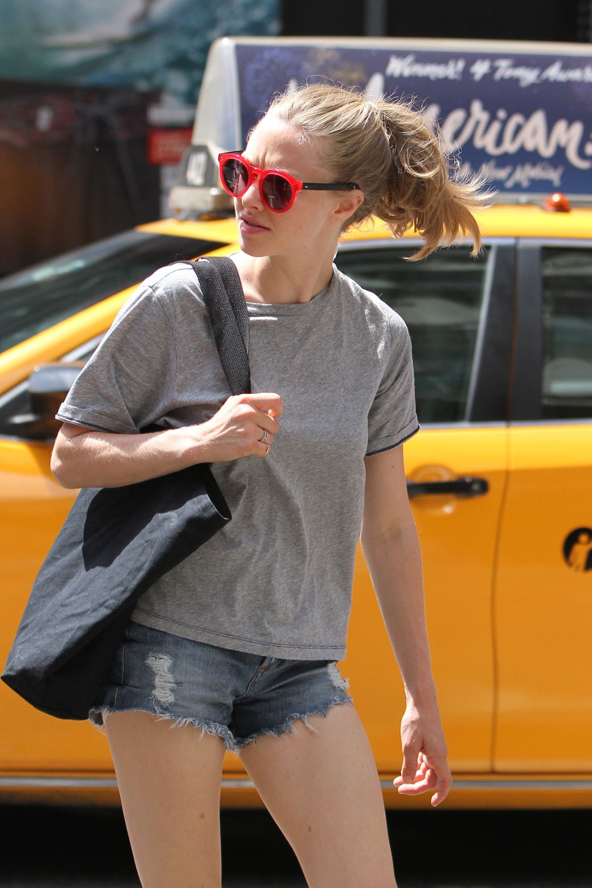 AMANDA SEYFRIED in Jeans Shorts Out in New York 08/12/2015. 