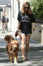 AMANDA SEYFRIED Walks Her Dog Finn Out in New York 08/29/2015