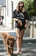 AMANDA SEYFRIED Walks Her Dog Finn Out in New York 08/29/2015