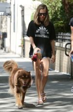 AMANDA SEYFRIED Walks Her Dog Finn Out in New York 08/29/2015