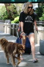 AMANDA SEYFRIED Walks Her Dog Finn Out in New York 08/29/2015