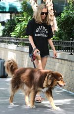 AMANDA SEYFRIED Walks Her Dog Finn Out in New York 08/29/2015