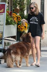 AMANDA SEYFRIED Walks Her Dog Finn Out in New York 08/29/2015