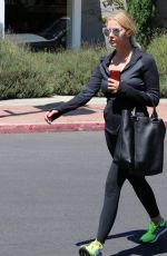 ASHLEY BENSON in tights Out And About in Los Angeles 08/13/2015