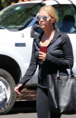ASHLEY BENSON in tights Out And About in Los Angeles 08/13/2015