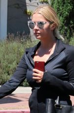 ASHLEY BENSON in tights Out And About in Los Angeles 08/13/2015