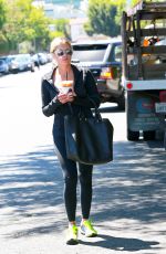 ASHLEY BENSON in tights Out And About in Los Angeles 08/13/2015