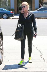 ASHLEY BENSON in tights Out And About in Los Angeles 08/13/2015