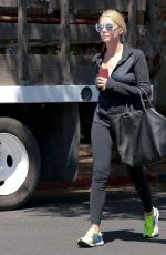 ASHLEY BENSON in tights Out And About in Los Angeles 08/13/2015