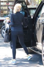 ASHLEY BENSON in tights Out And About in Los Angeles 08/13/2015