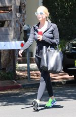 ASHLEY BENSON in tights Out And About in Los Angeles 08/13/2015