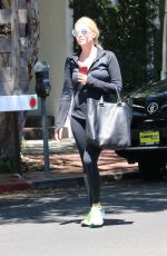 ASHLEY BENSON in tights Out And About in Los Angeles 08/13/2015