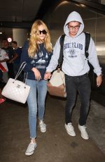 BELLA THORNE at Los Angeles International Airport 08/04/2015