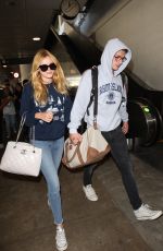 BELLA THORNE at Los Angeles International Airport 08/04/2015