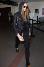 CARA DELEVINGNE Arrives at Los Angeles International Airport 08/28/2015