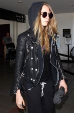 CARA DELEVINGNE Arrives at Los Angeles International Airport 08/28/2015