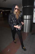 CARA DELEVINGNE Arrives at Los Angeles International Airport 08/28/2015