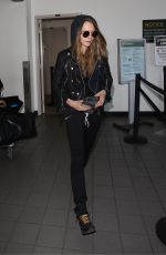 CARA DELEVINGNE Arrives at Los Angeles International Airport 08/28/2015