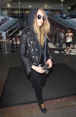 CARA DELEVINGNE Arrives at Los Angeles International Airport 08/28/2015