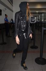 CARA DELEVINGNE Arrives at Los Angeles International Airport 08/28/2015