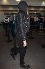 CARA DELEVINGNE Arrives at Los Angeles International Airport 08/28/2015