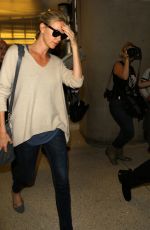 CHARLIZE THERON Arrives at Los Angeles International Airport 07/31/2015