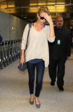CHARLIZE THERON Arrives at Los Angeles International Airport 07/31/2015