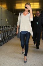 CHARLIZE THERON Arrives at Los Angeles International Airport 07/31/2015